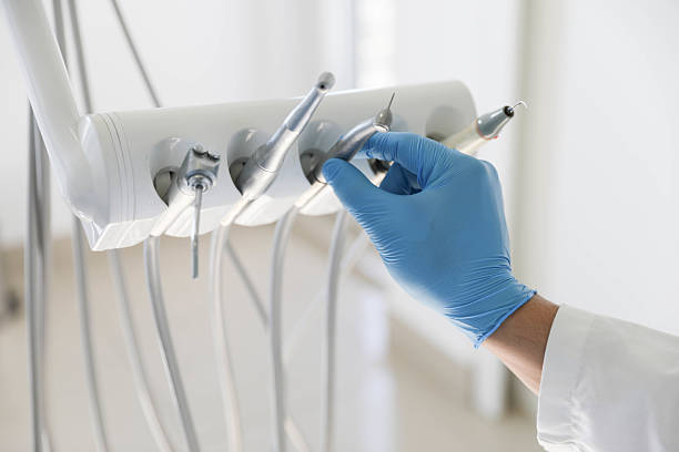 Professional Invisalign Clear Aligners technician working in Fairport, NY